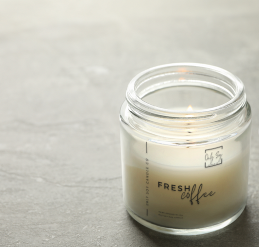 Fresh coffee scented soy wax candle hand poured in the USA. Long lasting, eco friendly & odor eliminating.